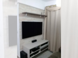 Home theater com nichos e prateleiras - Marcenaria Ferraz